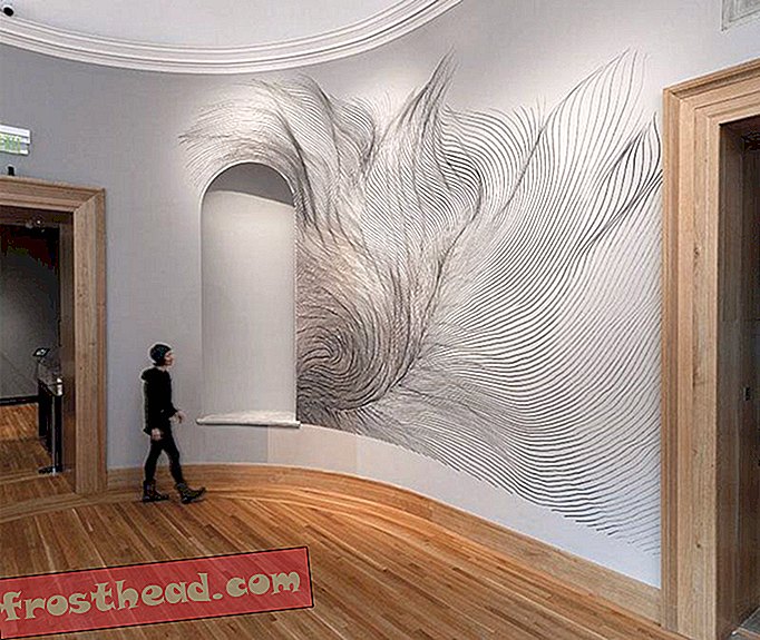 Os visitantes do museu podem jogar esta arte da parede como um instrumento