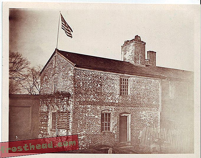 SQ_historic_exterior_with_flag_and_outbuilding_RHAPC.jpg